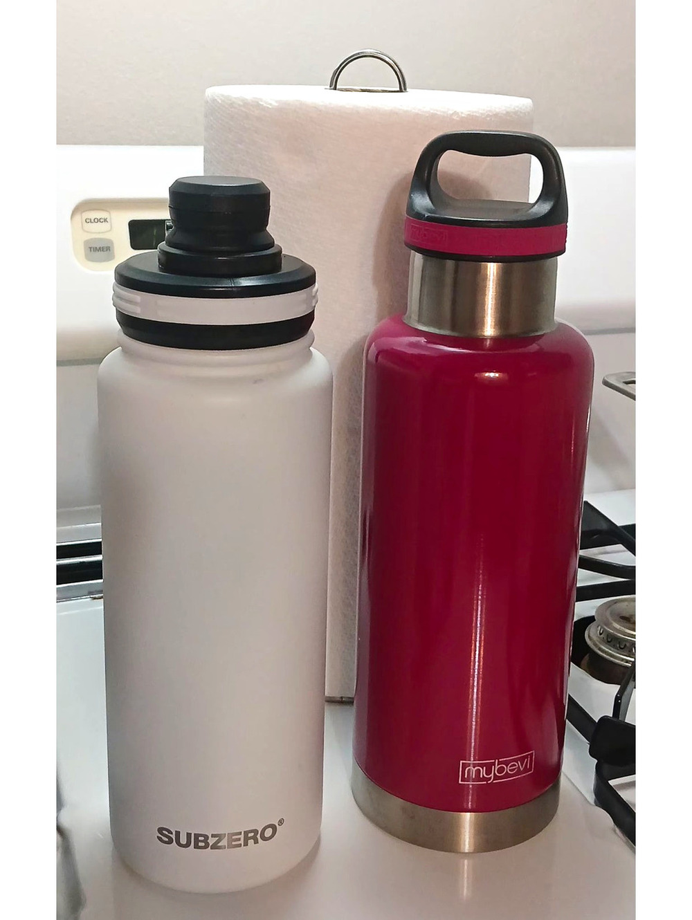 white SUBZERO and hot pink MYBEVI stainless steel insulated bundle